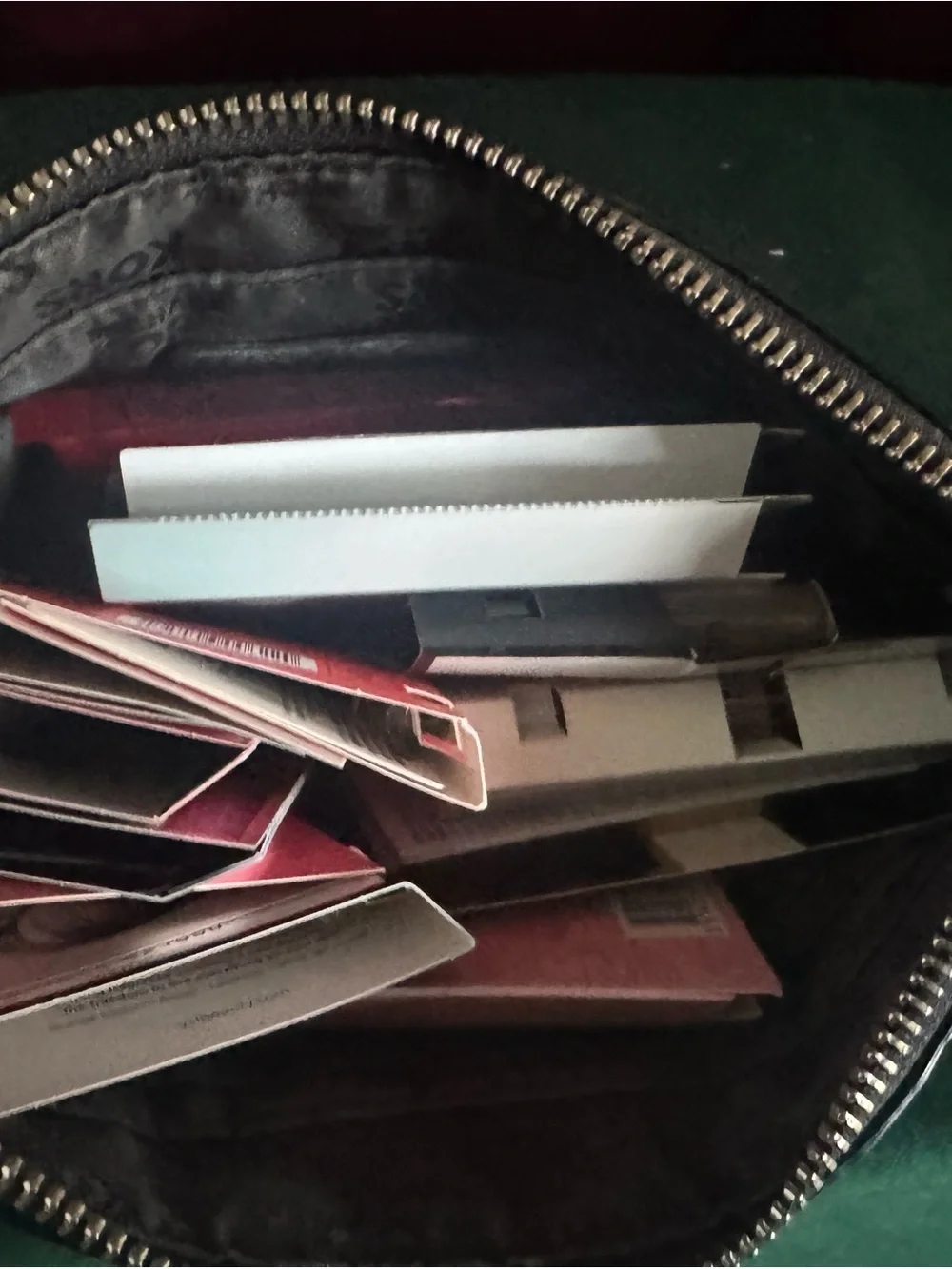 Micheal Kors Wristlet stuffed with minis